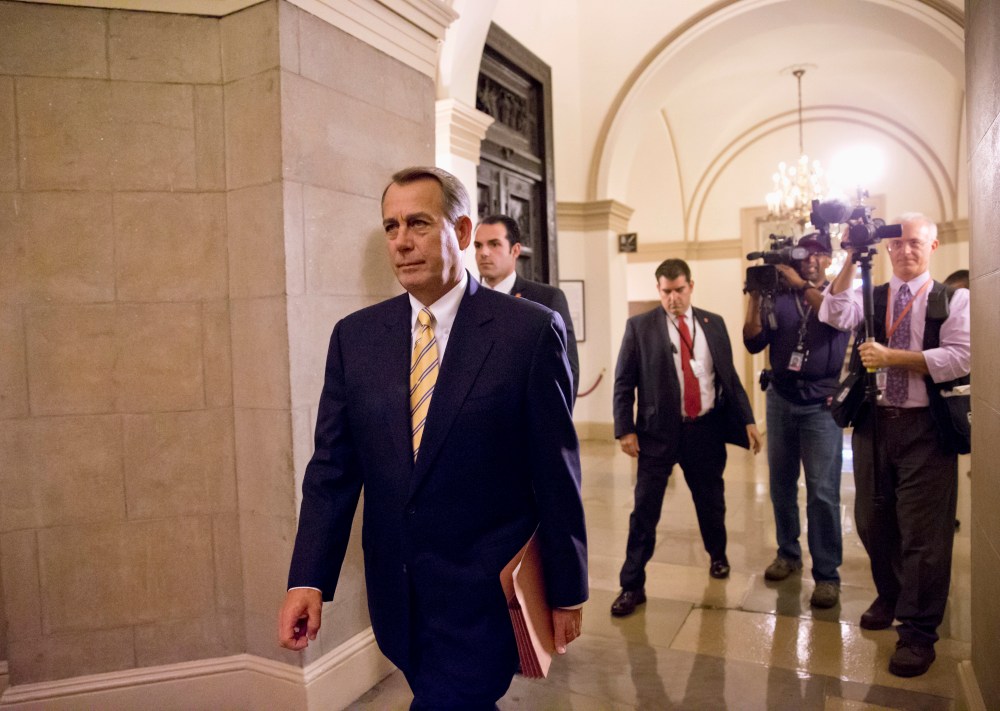 House Speaker John Boehner of Ohio arrives on Capitol Hill in Washington, Wednesday, Oct. 9, 2013.