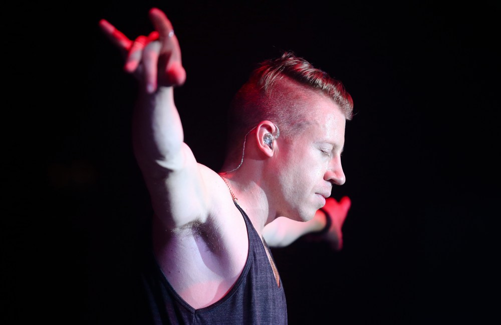 Hip-hop artist Macklemore preforms at the Best Buy Theater in Times Square on Nov. 21, 2013, in New York.