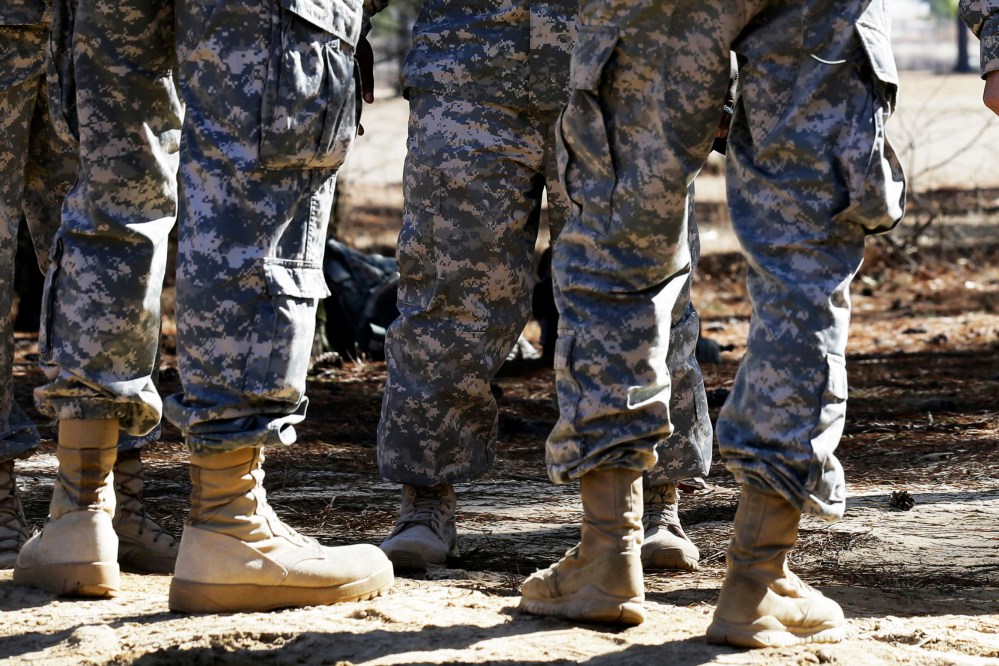 Troops stand at Fort Bragg, North Carolina, Feb. 18, 2014.