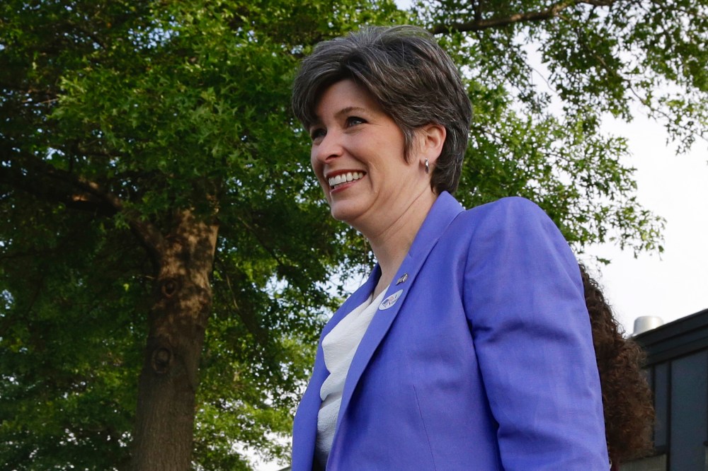 Republican U.S. Senate candidate Joni Ernst leaves the polling station after casting her ballot in Iowa's Republican primary in Red Oak, Iowa, June 3, 2014.