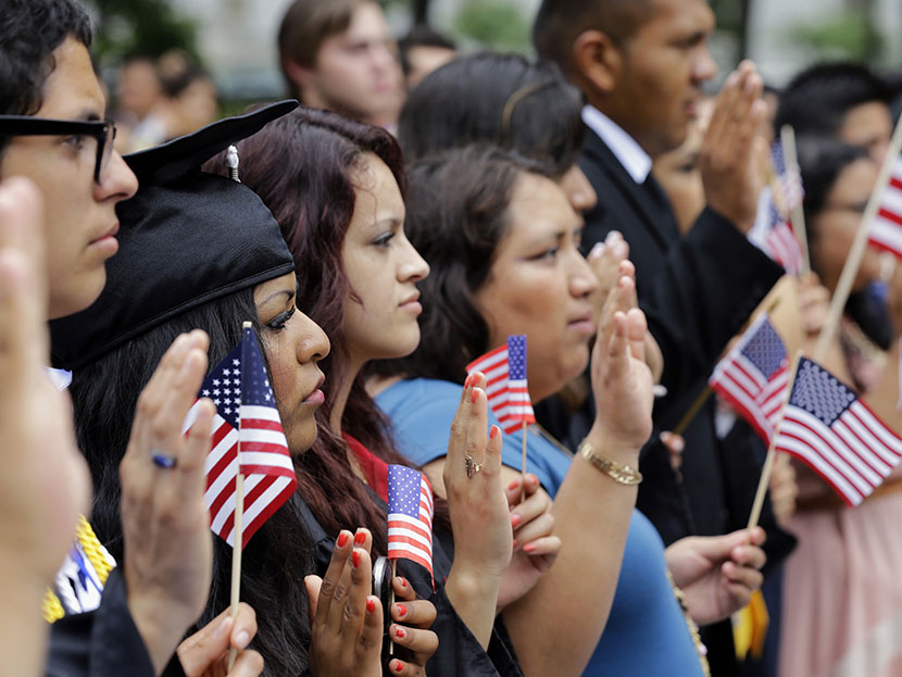 DREAMers (Development, Relief, and Education for Alien Minors) and parents take an oath in a mock citizenship ceremony during a "United We Dream," rally on Capitol Hill in Washington, Wednesday, July 10, 2013, sending a signal to the House of...
