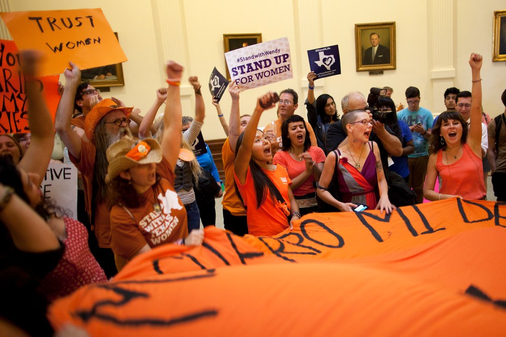 Abortion rights supporters rally on the floor of the State Capitol's rotunda in Austin, Texas, July 12, 2013.