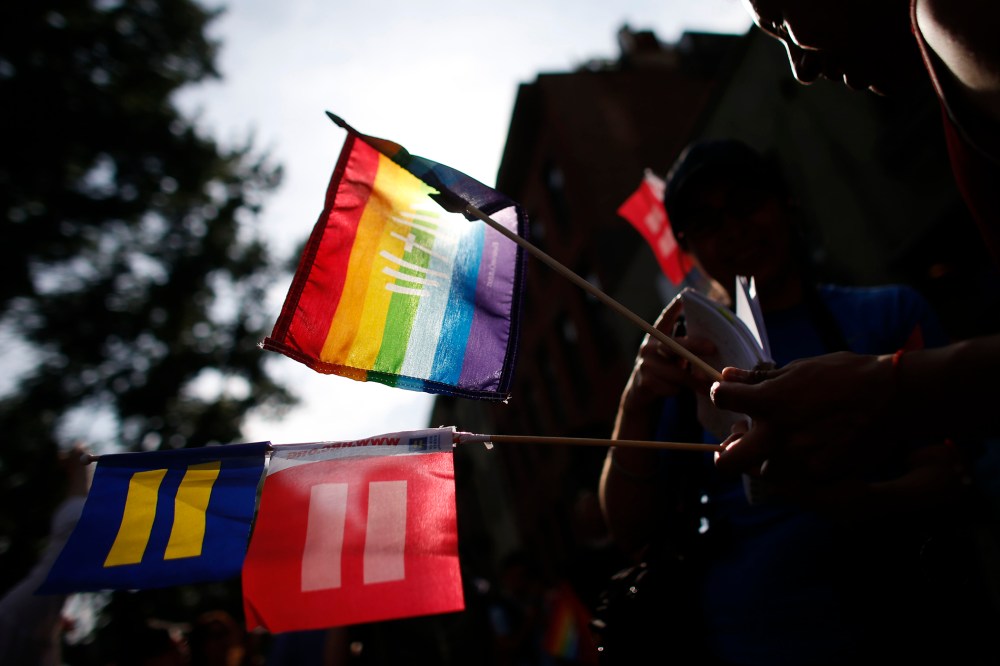 Members of the LGBT community and their supporters gather to celebrate two decisions by the U.S. Supreme Court, one to invalidate parts of the Defense of Marriage Act and another to uphold a lower court ruling that struck down California's controversial P