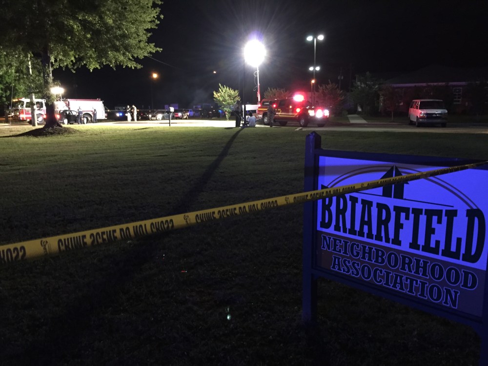 Police investigate the scene of a shooting in Hattiesburg, Miss., on May 9, 2015. Two police officers were killed in the shooting. (Photo by Jason Munz/The Hattiesburg American/AP)