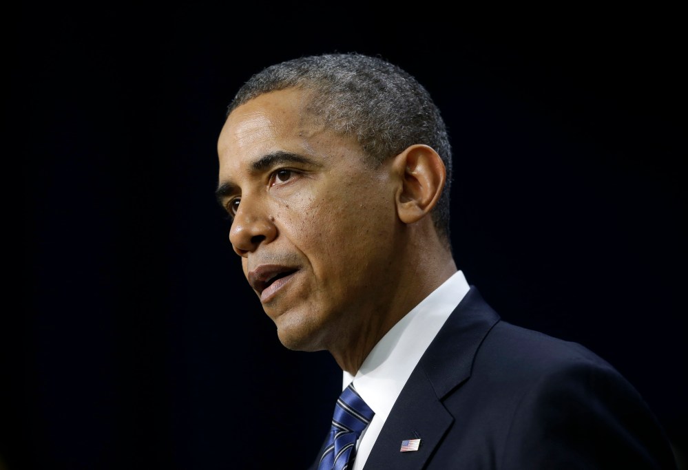 President Obama gestures as he speaks in the Eisenhower Executive Office Building, on the White House campus in Washington on Wednesday, Nov. 28, 2012. (AP Photo/Pablo Martinez Monsivais)