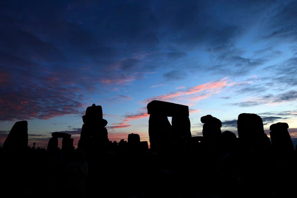 The Stonehenge monument on Salisbury Plain, southern England at sunrise.