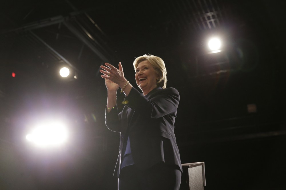 Democratic presidential candidate Hillary Clinton leaves the podium during a rally in Purchase, March 31, 2016. (Photo by Seth Wenig/AP)