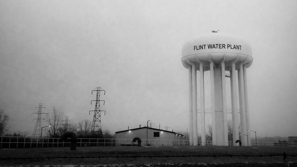 This Jan. 21, 2016 photo shows the water tower at the Flint, Mich., water plant. (Photo by Perry Rech/American Red Cross/AP)