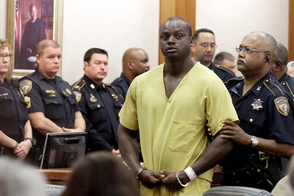 Shannon Miles is escorted out of a courtroom after a hearing on Aug. 31, 2015, in Houston, Texas. (Photo by Pat Sullivan/AP)