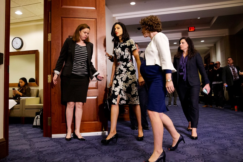 A longtime aide to Democratic presidential candidate Hillary Rodham Clinton returns to a hearing room on Capitol Hill in Washington, Oct. 16, 2015. (Photo by Jacquelyn Martin/AP)
