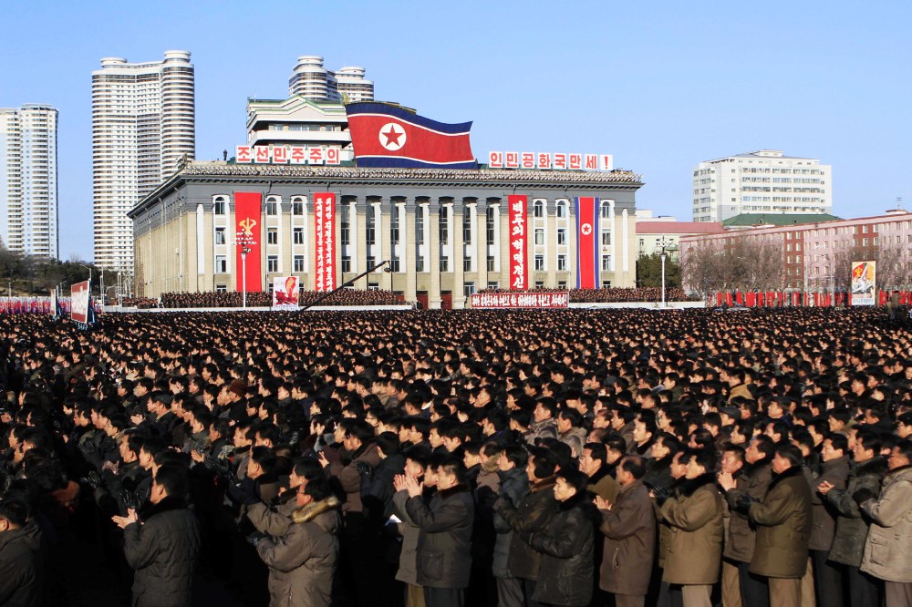 North Koreans gather at Kim Il Sung Square, following their leader Kim Jong Un's new year address in Pyongyang, North Korea, Jan. 5, 2016. (Photo by Jon Chol Jin/AP)