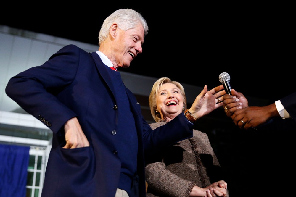 Democratic presidential candidate Hillary Clinton and her husband, former President Bill Clinton, speak at a "Get Out The Vote Rally" in Columbia, S.C., Feb. 26, 2016. (Photo by Gerald Herbert/AP)