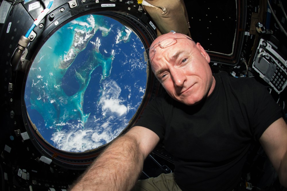 This July 12, 2015 photo made available by NASA, astronaut Scott Kelly poses for a selfie photo in the "Cupola" of the International Space Station. (Photo by Scott Kelly/NASA/AP)