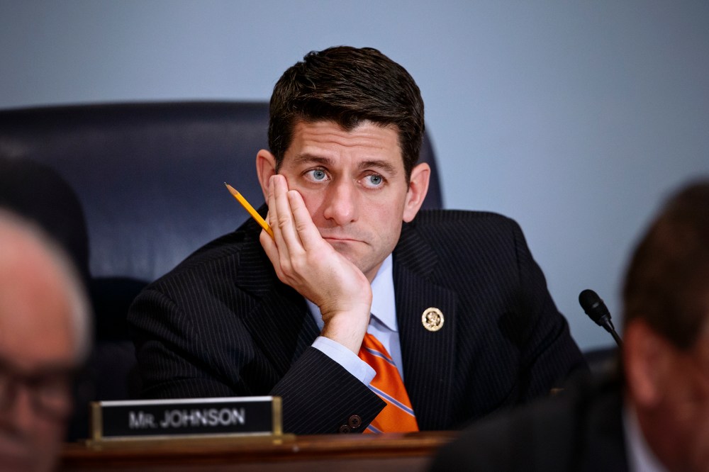 House Ways and Means Committee Chairman Paul Ryan, R-Wisc., listens as Treasury Secretary Jack Lew defends President Barack Obama's new budget proposals, on Capitol Hill in Washington, Feb. 3, 2015. (Photo by J. Scott Applewhite/AP)