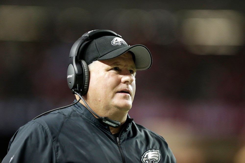 Philadelphia Eagles head coach Chip Kelly walks the sidelines during the first half of an NFL football game against the Atlanta Falcons, Sept. 14, 2015, in Atlanta, Ga. (Photo by Brynn Anderson/AP)