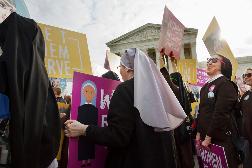 Nuns of the Order of St. Francis, from Mishawaka, Ind., rally outside the Supreme Court in Washington, March 23, 2016. (Photo by Jacquelyn Martin/AP)