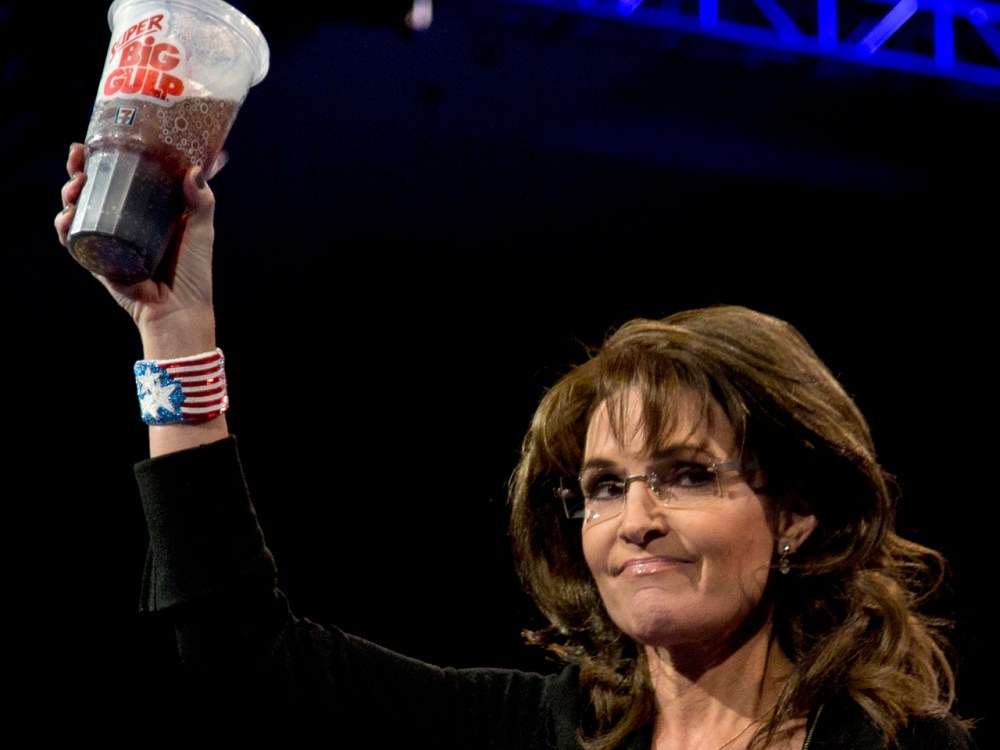 Former Alaska Gov. Sarah Palin holds up a 7-Eleven Super Big Gulp soda on stage at the 40th annual Conservative Political Action Conference in National Harbor, Md., Saturday, March 16, 2013. Earlier in the week a New York judge struck down a ban...