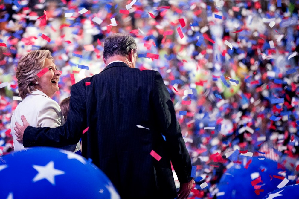Democratic presidential candidate Hillary Clinton and Democratic vice presidential candidate, Sen. Tim Kaine, D-Va., right, stand on stage on the final day of the Democratic National Convention in Philadelphia, Pa., July 28, 2016. (Andrew Harnik/AP)