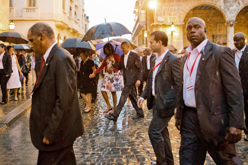U.S. President Barack Obama, center, walks with first lady Michelle Obama, who is holding the arm of her mother Marian Robinson, during a walking tour of Old Havana, Cuba, March 20, 2016. (Photo by Pablo Martinez Monsivais/AP)