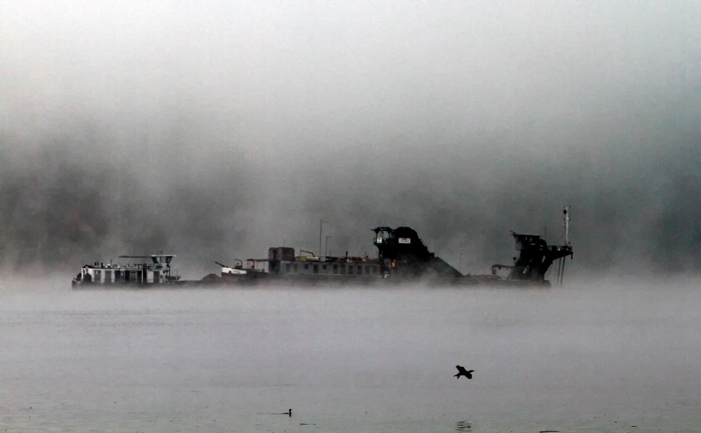 A ship on a foggy morning.