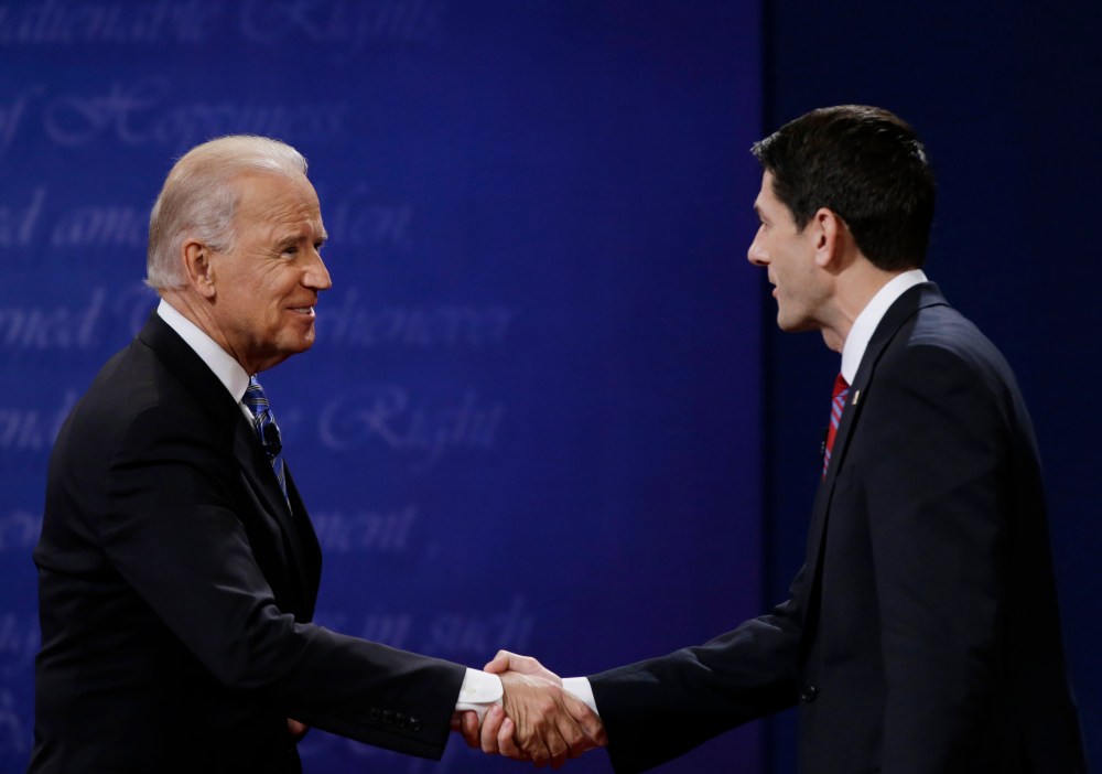 Vice President Joe Biden, left, and GOP VP nominee Rep. Paul Ryan shake hands following their the vice presidential debate at Centre College in Danville, Ky. (Photo: AP Photo/David Goldman)