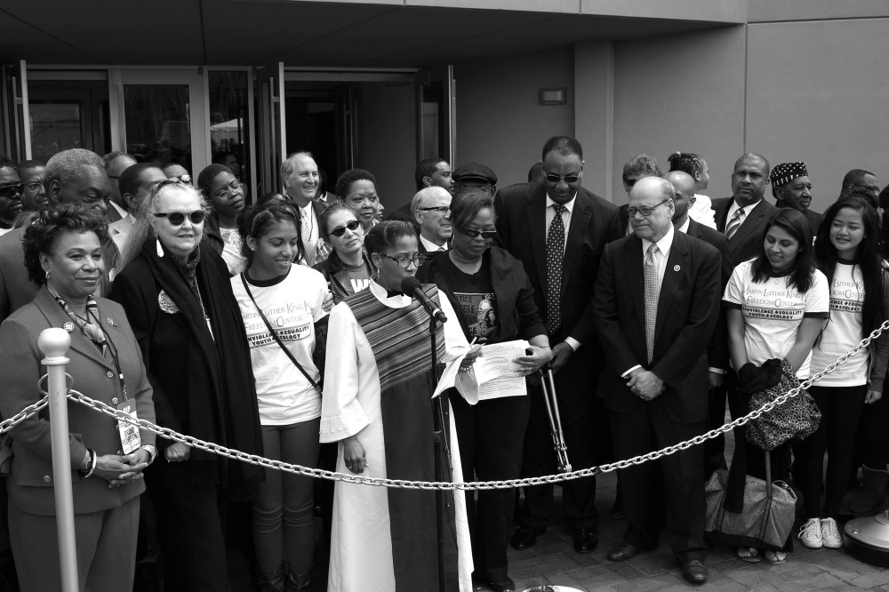 Officials break the chain signifying the reopening of the National Civil Rights Museum, April 5, 2014, in Memphis, Tenn.