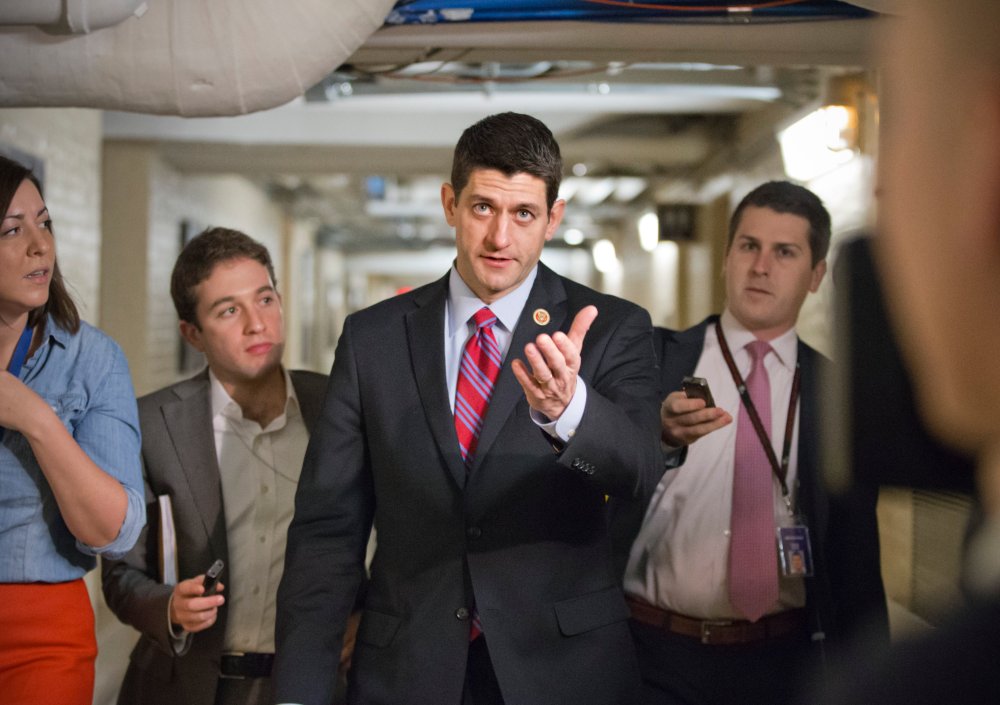 House Budget Committee Chairman Rep. Paul Ryan, R-Wis., walking through a basement corridor on Capitol Hill in Washington, Wednesday, Dec. 11, 2013.