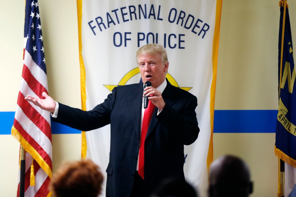 Republican presidential candidate Donald Trump speaks to retired and active law enforcement personnel at a Fraternal Order of Police lodge during a campaign stop in Statesville, N.C. on Aug. 18, 2016. (Photo by Gerald Herbert/AP)