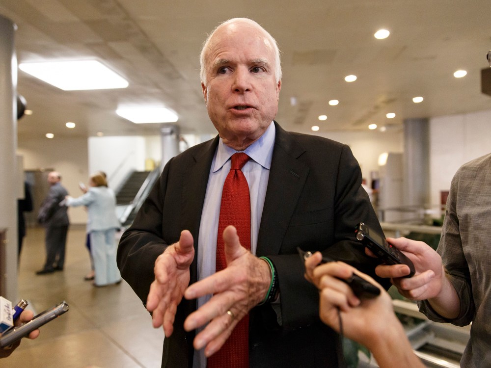 Sen. John McCain, R-Ariz., speaks to reporters at the Capitol in Washington, Wednesday, June 4, 2014.