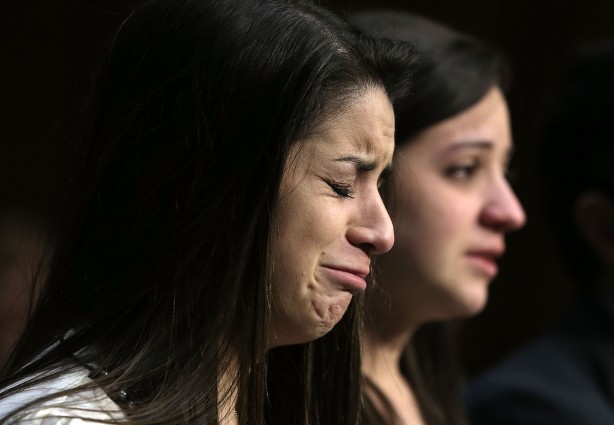 WASHINGTON, DC - FEBRUARY 27: Sisters of Sandy Hook Elementary shooting victim first-grade teacher Victoria Soto, Jillian Soto (R) and Carlee Soto (L) listen during a hearing before the Senate Judiciary Committee February 27, 2013 in Washington, DC. ...