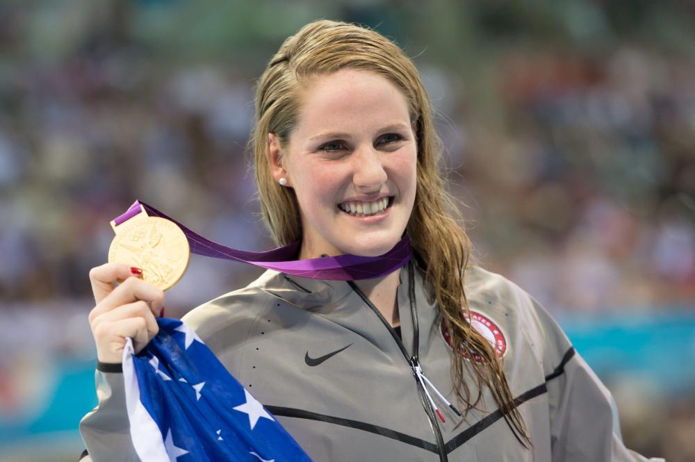 Missy Franklin wins gold in 100m backstroke at the London Olympics.