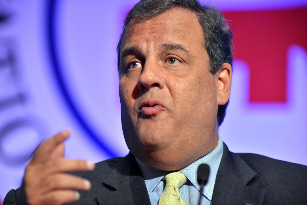 Image: New Jersey Governor Chris Christie gestures as he speaks to media and homeowners about the ongoing recovery from Hurricane Sandy in Manahawkin, New Jersey