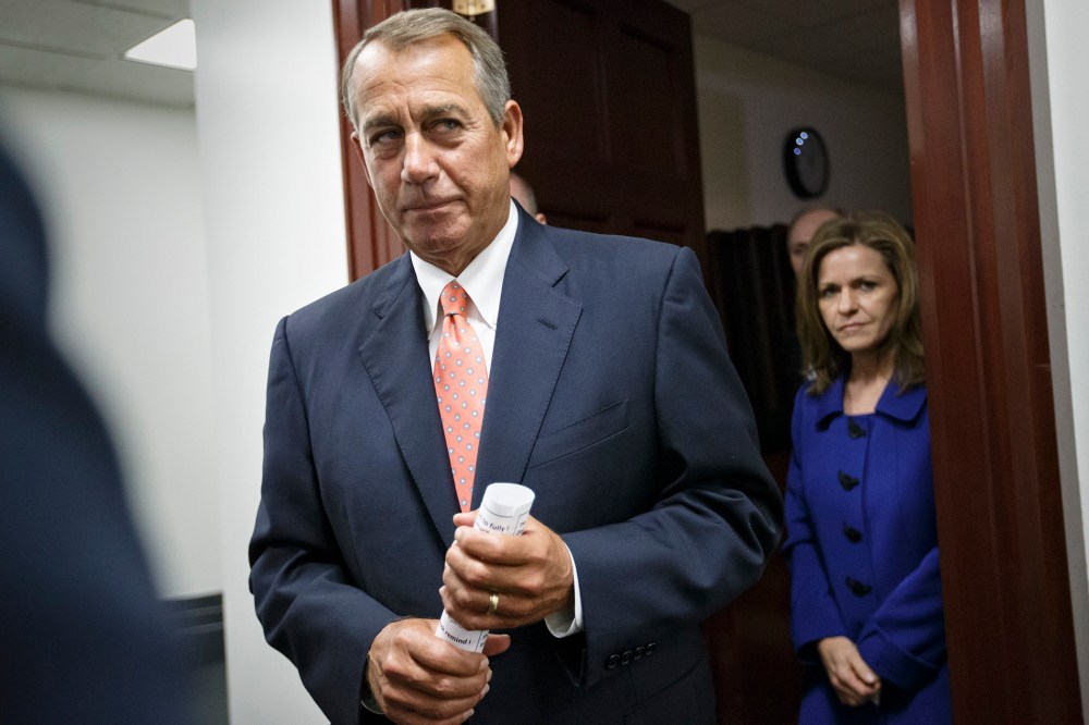 House Speaker John Boehner leaves a closed-door meeting of the House Republican Conference, on Capitol Hill in Washington, on Jan. 13, 2015. (Photo by J. Scott Applewhite/AP)