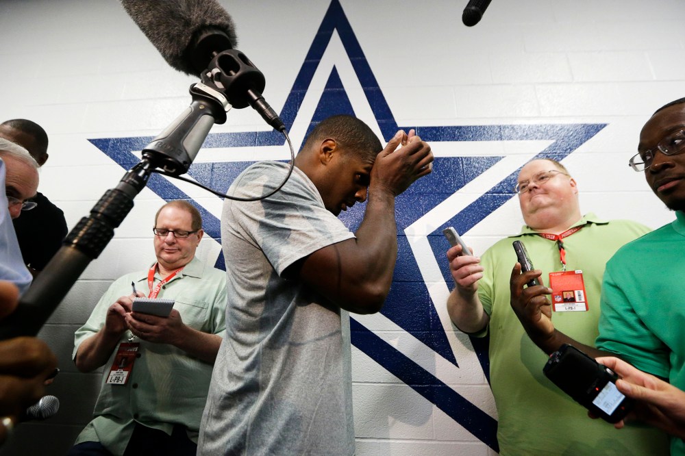 Dallas Cowboys practice squad player defensive end Michael Sam arrives to speak to reporters after team practice on Sept. 3, 2014, in Irving, Texas.