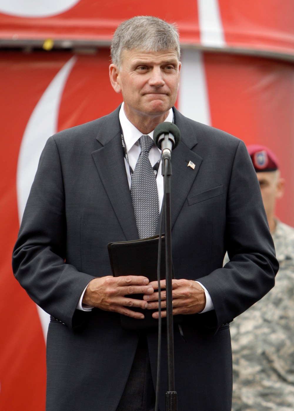 Franklin Graham prepares to give the invocation before the NASCAR Coca-Cola 600 auto race at Lowe's Motor Speedway in Concord, N.C., May 24, 2009.
