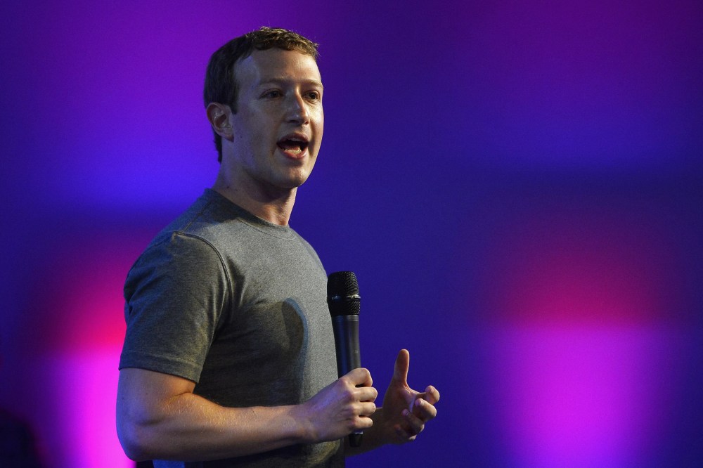 US chairman and chief executive of Facebook Mark Zuckerberg gestures as he announces the Internet.org Innovation Challenge in India in New Delhi on Oct. 9, 2014.