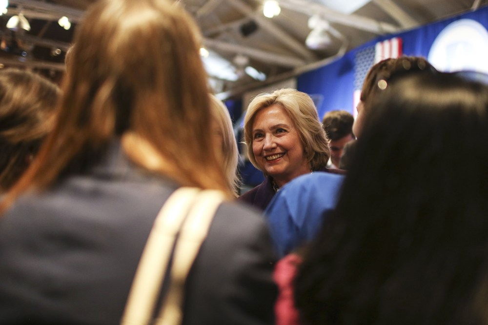 Democratic presidential candidate Hillary Clinton greets supporters after speaking at the New Hampshire Democrats party's annual dinner in Manchester, N.H., Nov. 29, 2015. (Photo by Cheryl Senter/AP)