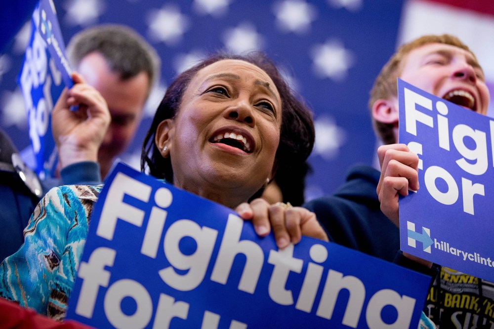 Supporters cheer as Democratic presidential candidate Hillary Clinton speaks at a get out the vote event at Transylvania University in Lexington, Ky., May 16, 2016. (Photo by Andrew Harnik/AP)