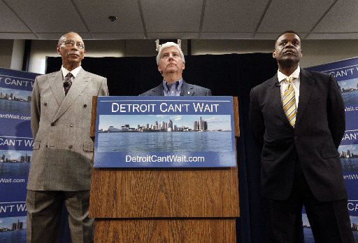 Detroit Mayor Dave Bing, left, Gov. Rick Snyder and Kevyn Orr, right, listen to a question during a news conference in Detroit, Thursday, March 14, 2013. Snyder announced that he had chosen Orr, a partner in the Cleveland-based law and restructuring...