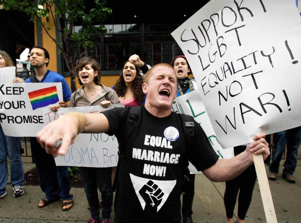 File Photo: Keegan O'Brien of Worcester, Mass., leads chants as members of the LGBT (lesbian, gay, bisexual, transgender) community protest the Defense of Marriage Act outside a Democratic National Committee fundraiser at which Vice President Joe Biden...