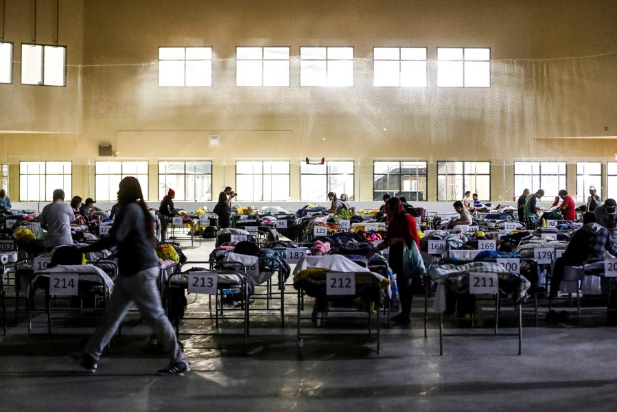 Evacuees from the Fort McMurray wildfires use the sleeping room at the 