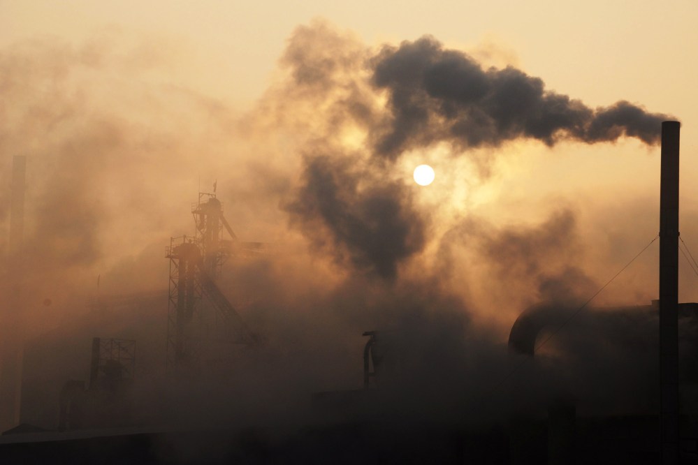 A cement factory releasing heavy smoke in Binzhou, in eastern China's Shandong province on Jan. 17, 2013. (Photo by STR/AFP/Getty)