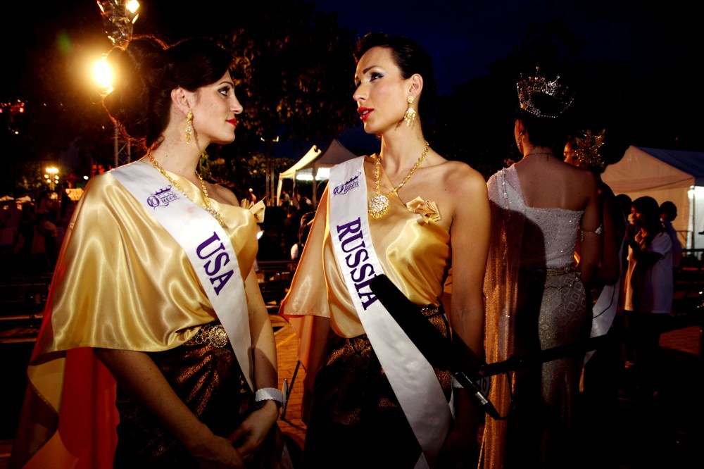 Contestants for Miss Queen International 2014, Transgender beauty pageant Miss Samira Sitara from USA speak with Miss Veronika Svetlova from Russia at the Loy Krathong festival ceremony in Bangkok. (Photo by Piti A Sahakorn/LightRocket/Getty)