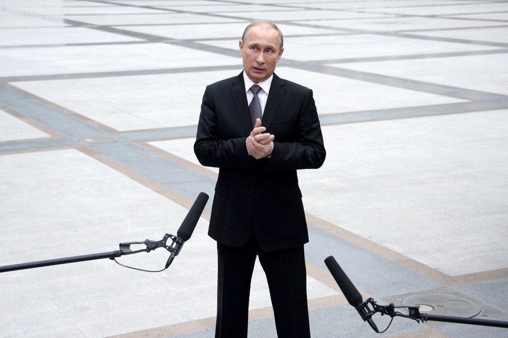 Russian President Vladimir Putin speaks with journalists in central Moscow on April 16, 2015. (Photo by Alexander Nemenov/AFP/Getty)