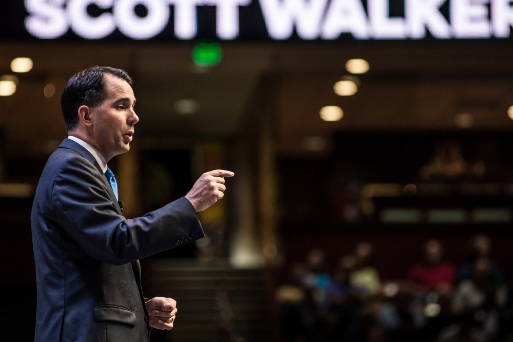 Wis.n Governor and republican presidential candidate Scott Walker speaks to voters at the Heritage Action Presidential Candidate Forum on Sept. 18, 2015 in Greenville, S.C. (Photo by Sean Rayford/Getty)