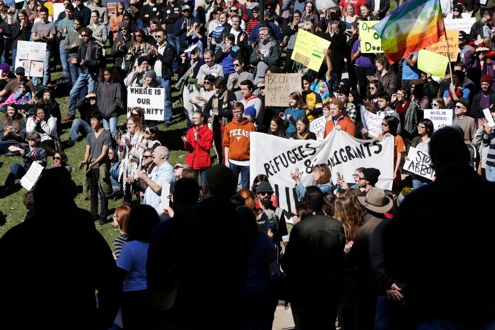 Members of The Syrian People Solidarity Group protest Texas governor Greg Abbott's refusal to allow Syrian refugees in the state on Nov. 22, 2015 in Austin. (Photo by Erich Schlegel/Getty)