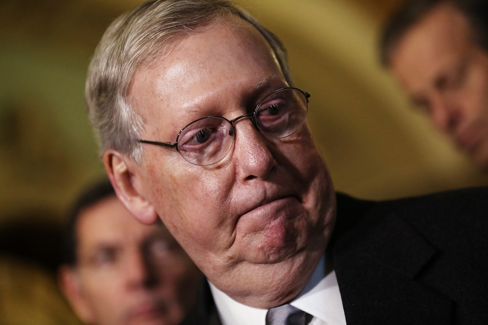 Senate Majority Leader Mitch McConnell (R-KY) listens to a question during a press conference following the weekly policy meeting at the U.S. Capitol Dec. 1, 2015 in Washington, DC. (Photo by Win McNamee/Getty)