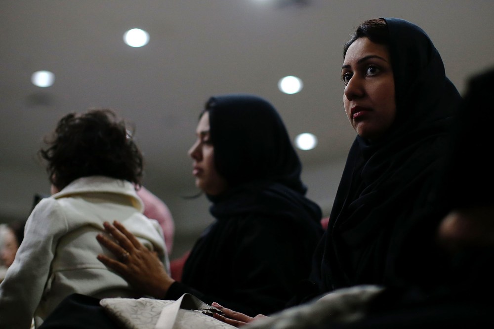 Muslim women look on during a prayer vigil for the victims of the San Bernardino shooting at Baitul Hameed Mosque on Dec. 3, 2015 in Chino, Calif. (Photo by Justin Sullivan/Getty)