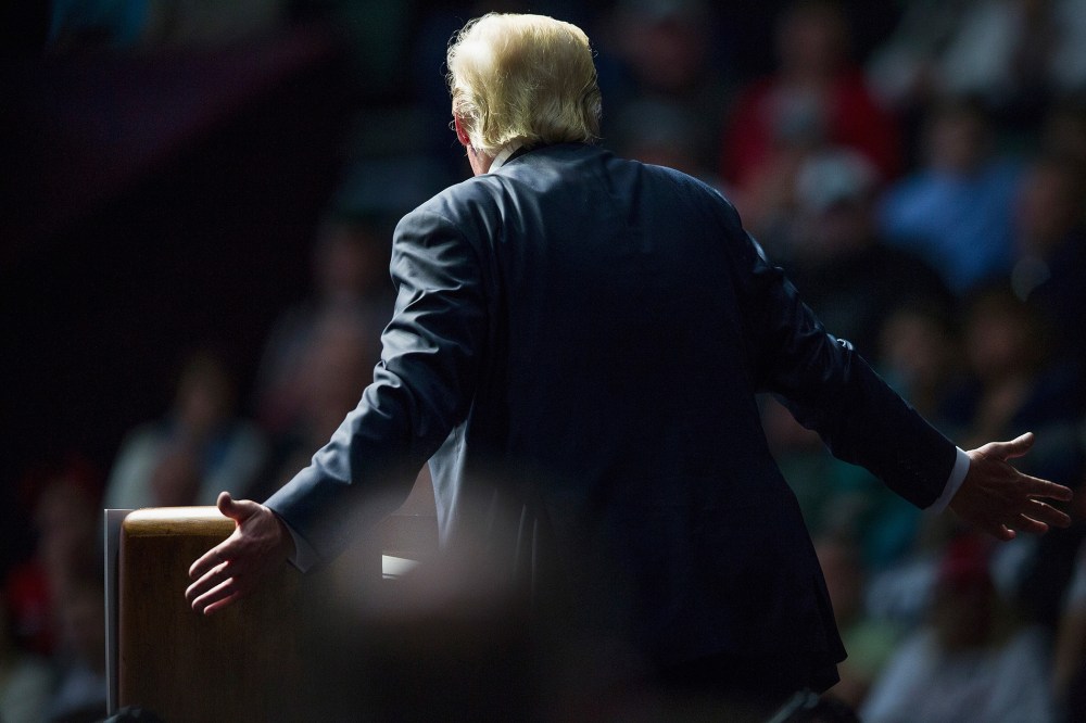 Republican presidential candidate Donald Trump speaks to guests at a campaign rally on Dec. 21, 2015 in Grand Rapids, Mich. (Photo by Scott Olson/Getty)