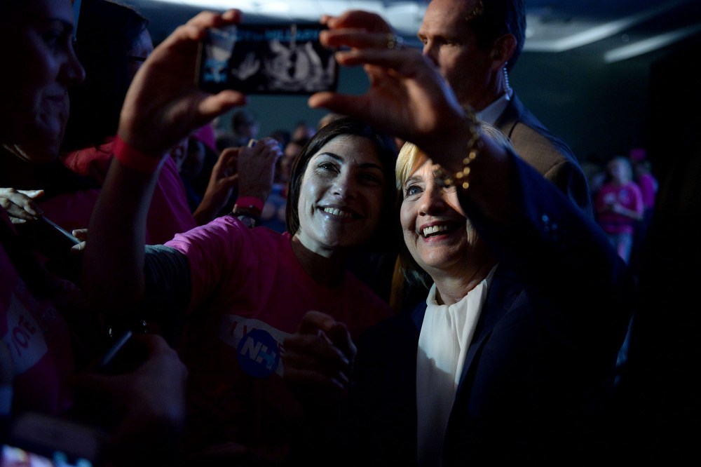 Democratic Presidential candidate Hillary Clinton takes a selfie with a supporter after receiving an endorsement from Planned Parenthood Action Fund, Jan. 10, 2016 in Hooksett, N.H. (Photo by Darren McCollester/Getty)